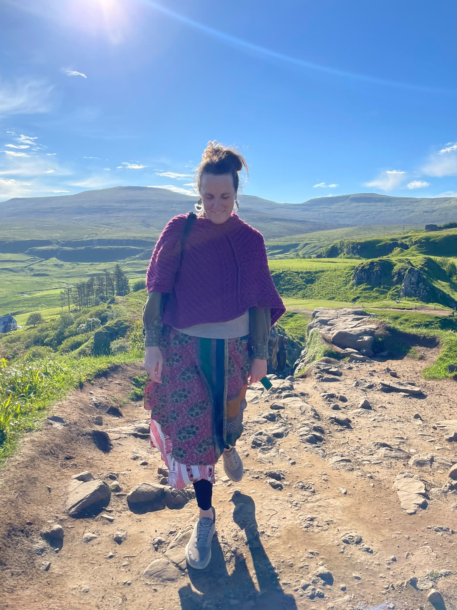 Walking through an open mountain landscape